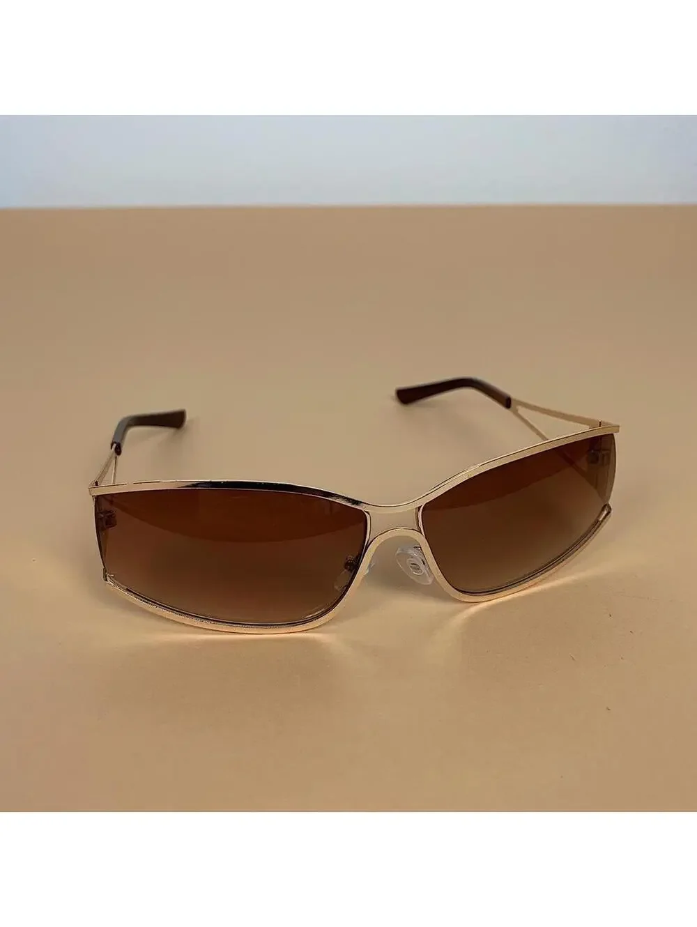 Cyber Grunge Vintage y2k 2000s classy chrome trim sunglasses. Chrome trim brown